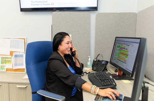 Woman taking call in office